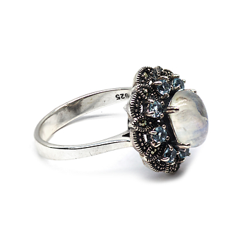 кольцо из капельного серебра с лунным камнем и голубыми топазами
