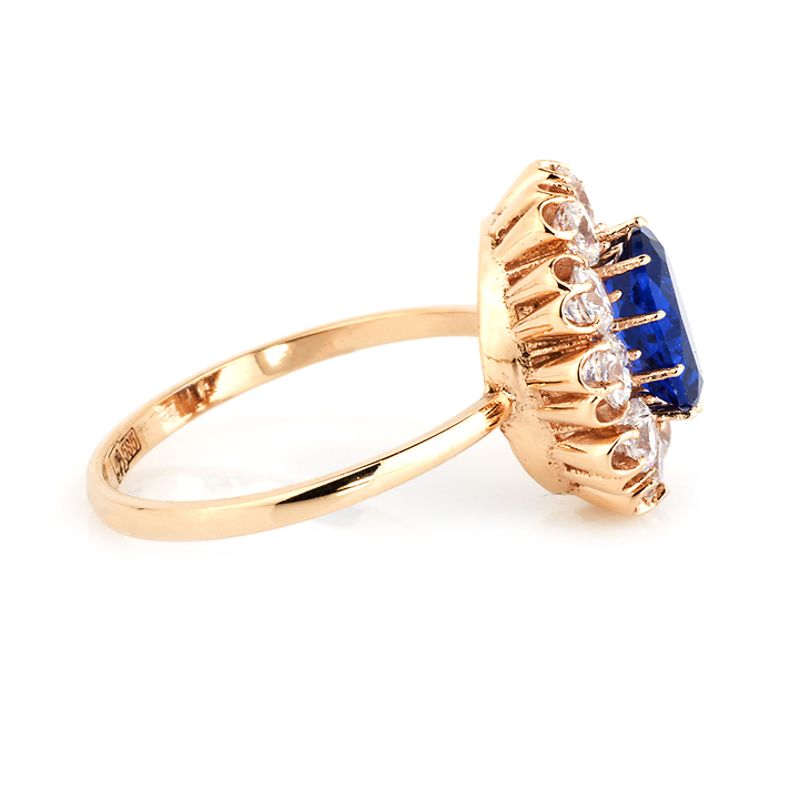 Золотое кольцо с синим фианитом